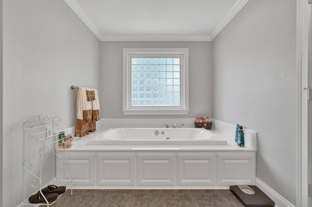 bathroom featuring tile patterned floors, crown molding, and a bathtub