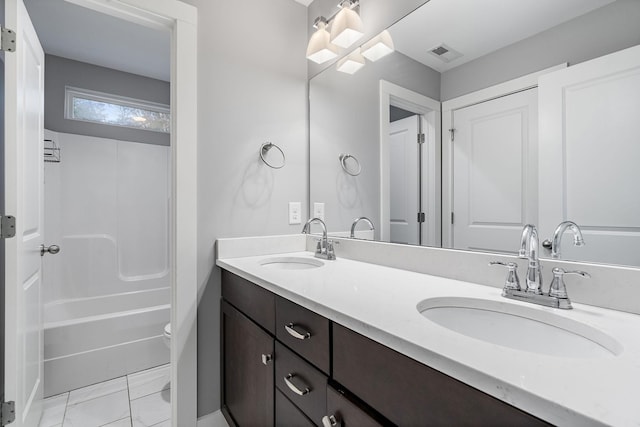 full bathroom featuring tile patterned floors, vanity, shower / bathtub combination, and toilet