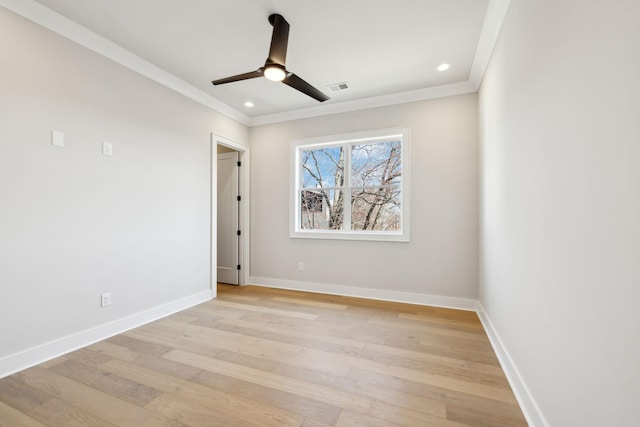 unfurnished room with visible vents, baseboards, light wood-style flooring, crown molding, and recessed lighting