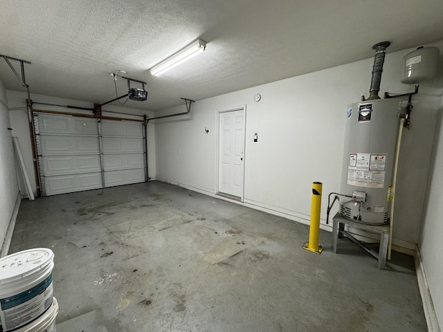 garage featuring a garage door opener and water heater