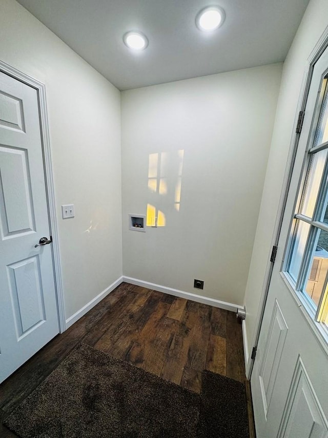 laundry area with washer hookup and dark hardwood / wood-style floors