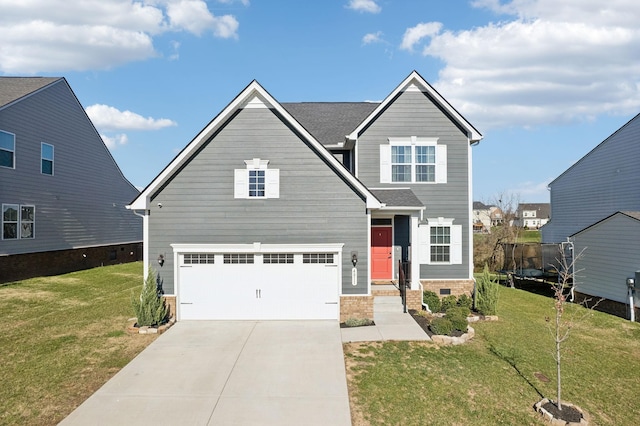 view of front facade featuring a front lawn and a garage