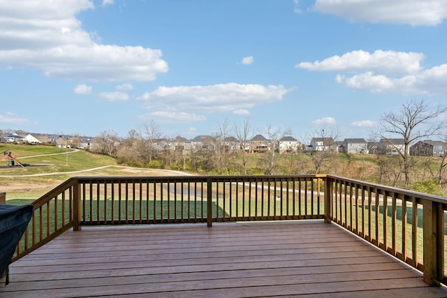 wooden deck with a yard