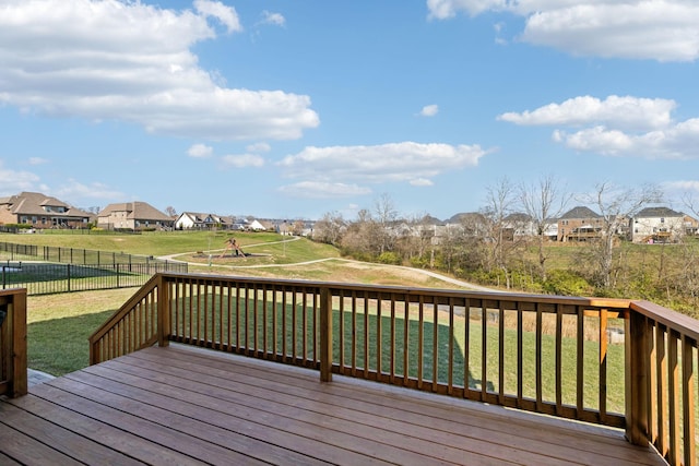 wooden terrace with a yard