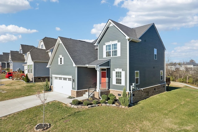 view of front of property featuring a front yard and a garage