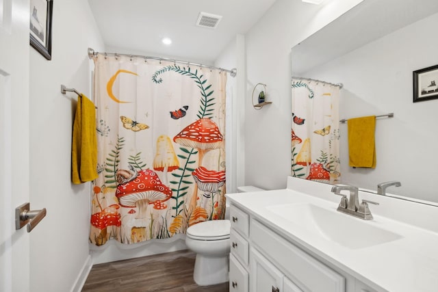 bathroom featuring a shower with curtain, vanity, toilet, and wood-type flooring