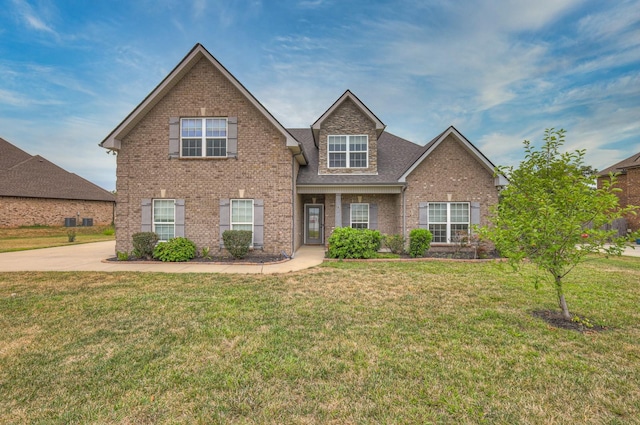 view of front of property with a front lawn