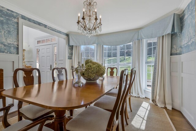 210 Green Rd, Franklin, TN 37069 - dining room with wallpapered walls, healthy amount of natural light, a chandelier, a wainscoted wall, and crown molding