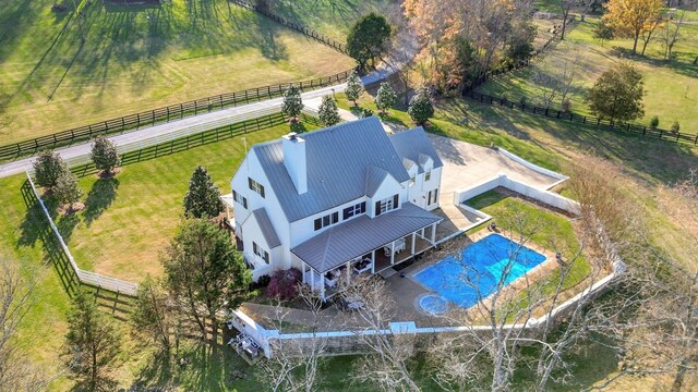 birds eye view of property featuring a rural view