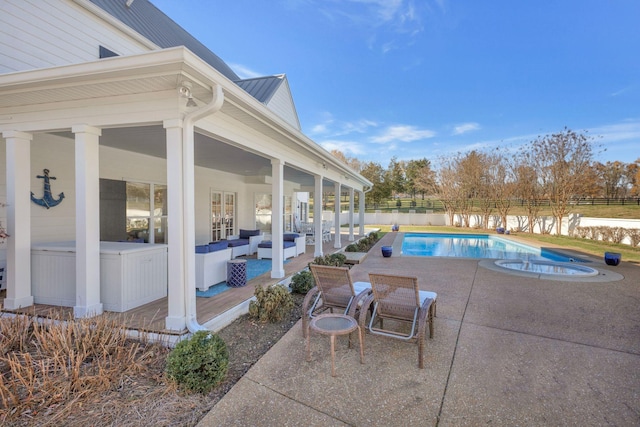 view of swimming pool with an outdoor hangout area and a patio