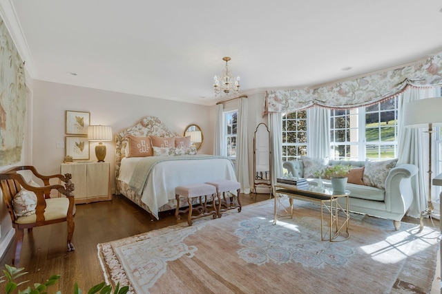 210 Green Rd, Franklin, TN 37069 - bedroom with wood finished floors, a chandelier, and ornamental molding