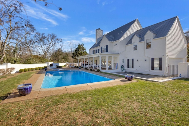 210 Green Rd, Franklin, TN 37069 - rear view of property with a patio area, a fenced backyard, a chimney, and a metal roof