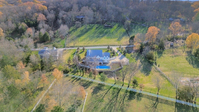 birds eye view of property featuring a rural view