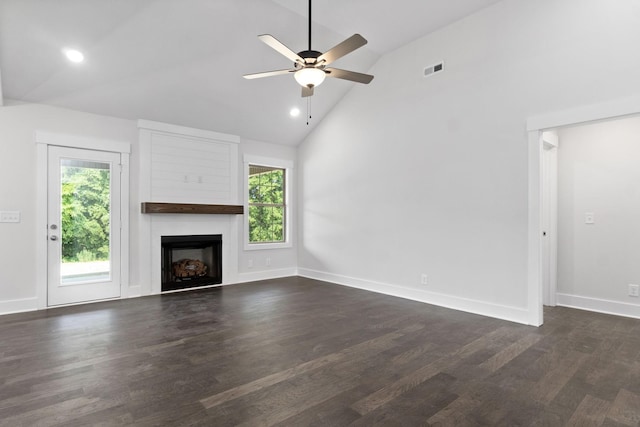 unfurnished living room featuring ceiling fan, dark hardwood / wood-style flooring, and high vaulted ceiling