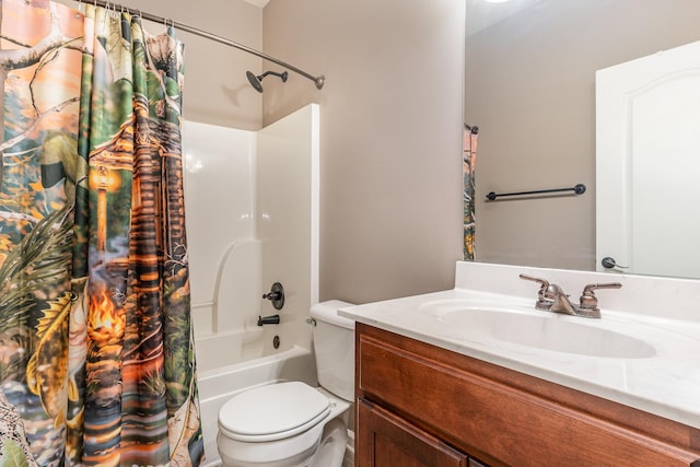 full bathroom featuring vanity, toilet, and shower / tub combo