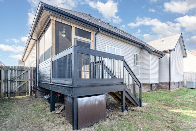 back of house with central AC and a wooden deck