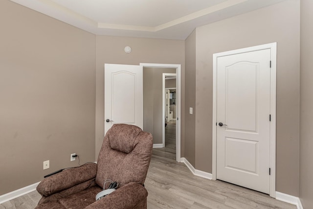 sitting room featuring light wood-type flooring