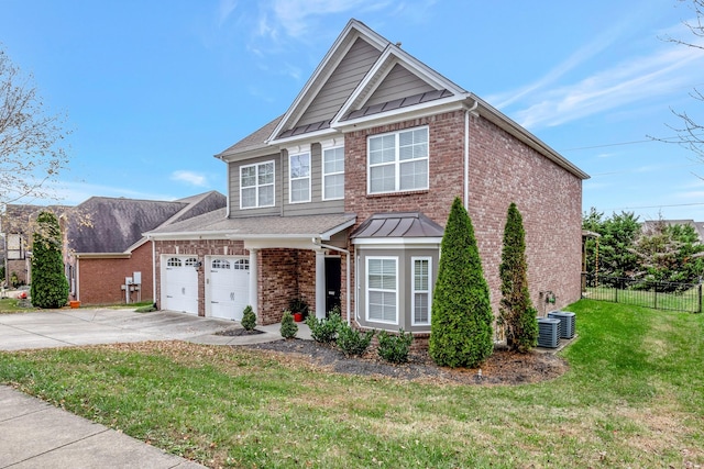 view of front of property with a front yard and a garage