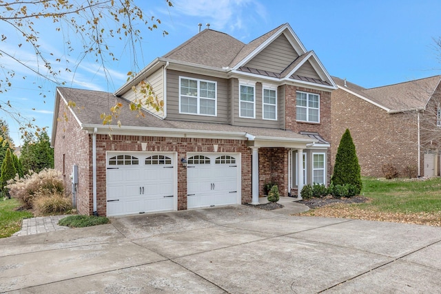 view of front of property featuring a garage