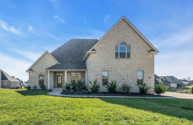 view of front of home with a front yard