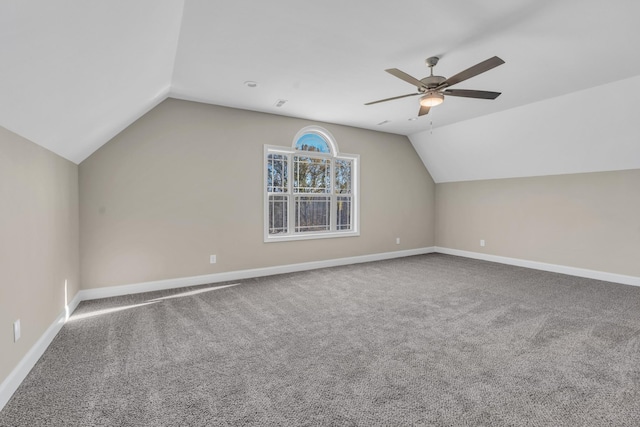 bonus room featuring ceiling fan, carpet floors, and lofted ceiling