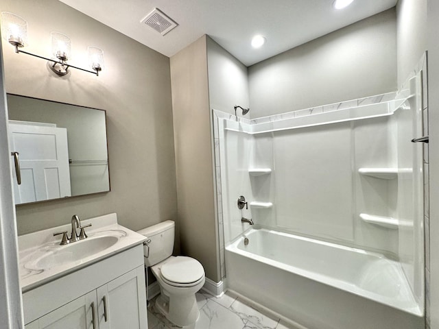 full bathroom featuring washtub / shower combination, vanity, and toilet