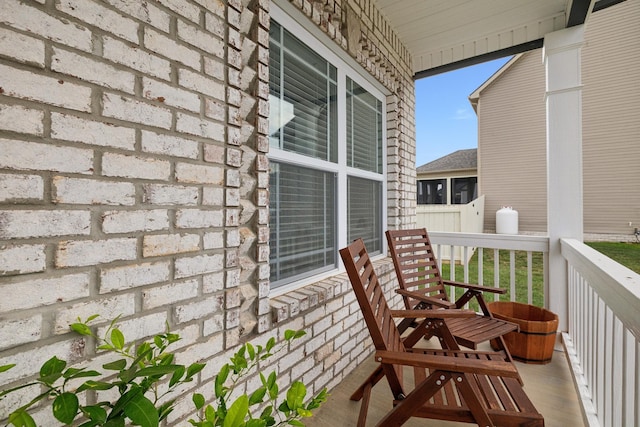 balcony featuring a porch