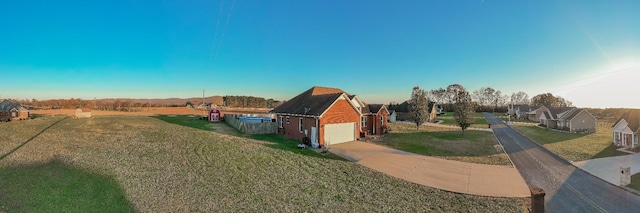 view of yard featuring a garage