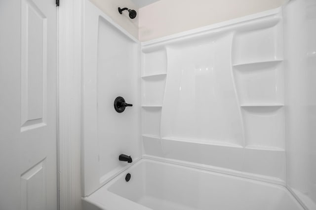 bathroom featuring  shower combination