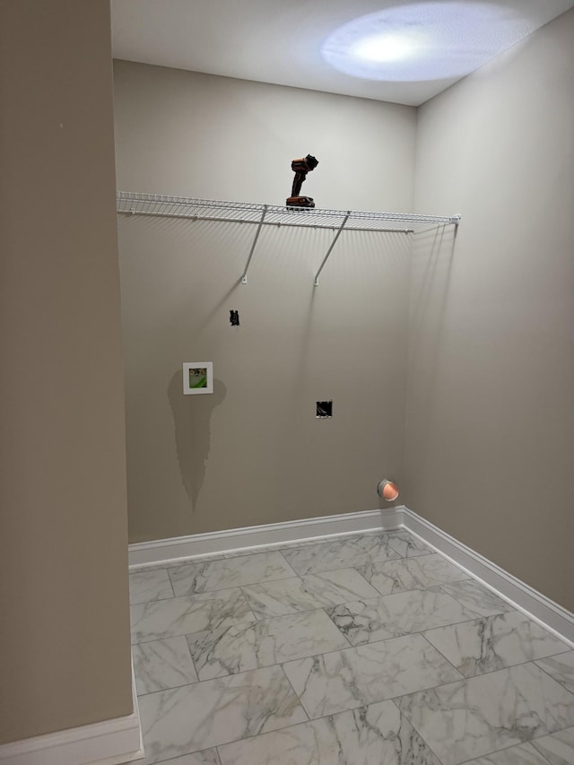 washroom with hookup for an electric dryer, laundry area, washer hookup, baseboards, and marble finish floor