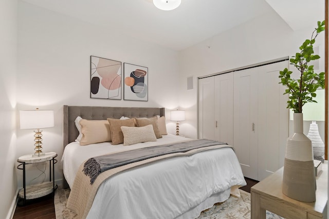 bedroom featuring a closet and hardwood / wood-style flooring