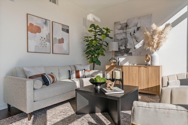 living room with dark hardwood / wood-style floors