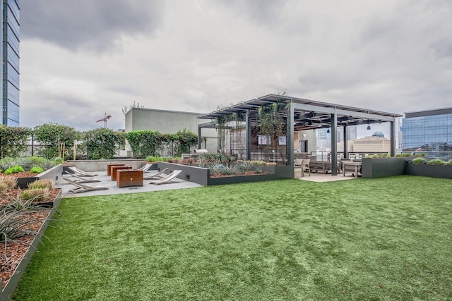 view of yard featuring outdoor lounge area, a patio area, and a pergola