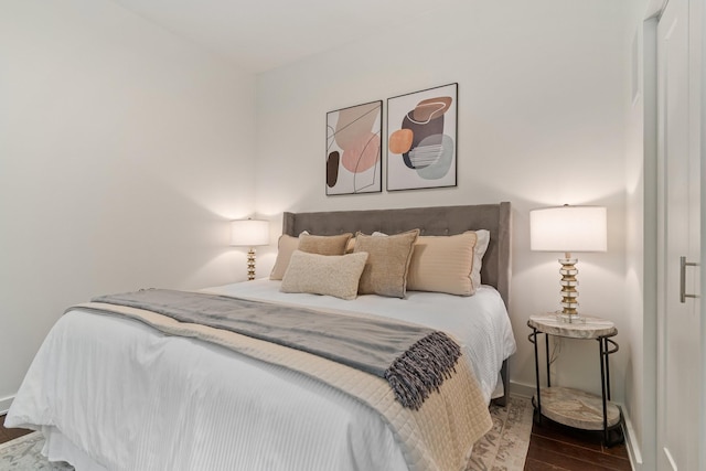 bedroom with wood-type flooring