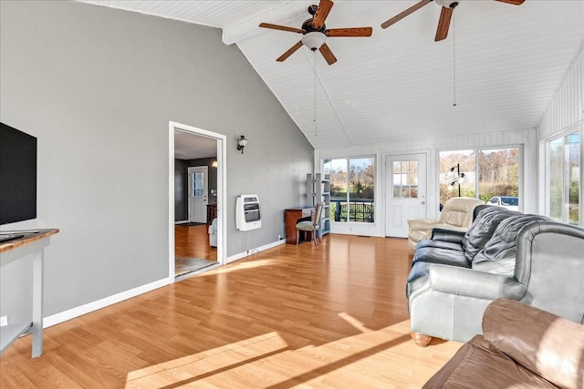 living room featuring high vaulted ceiling, ceiling fan, light wood-type flooring, beamed ceiling, and heating unit