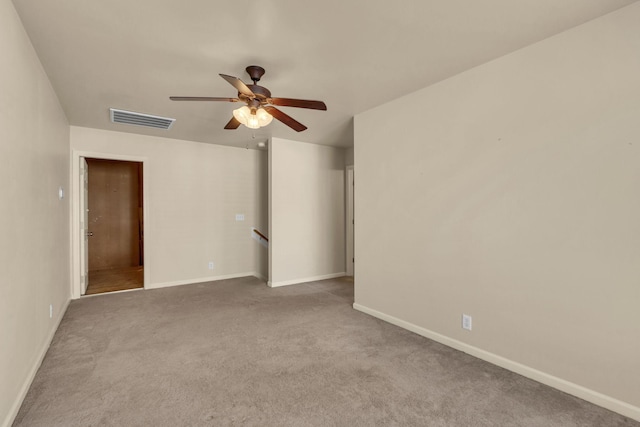 carpeted empty room with ceiling fan