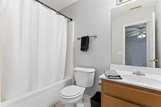 full bathroom with ceiling fan, shower / bath combination with curtain, a textured ceiling, toilet, and vanity