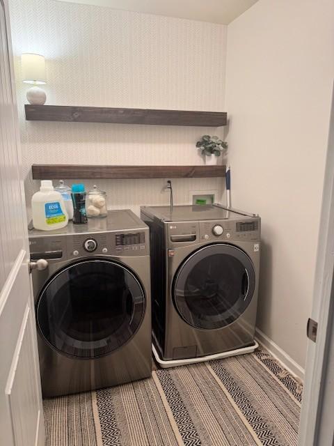 laundry room with washer and dryer