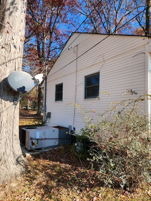 view of property exterior with central air condition unit