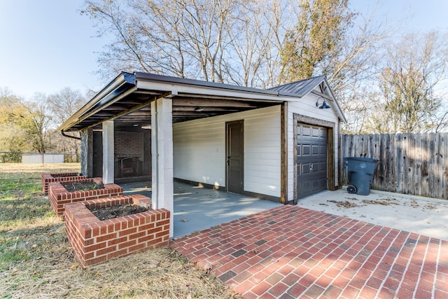 garage featuring a carport