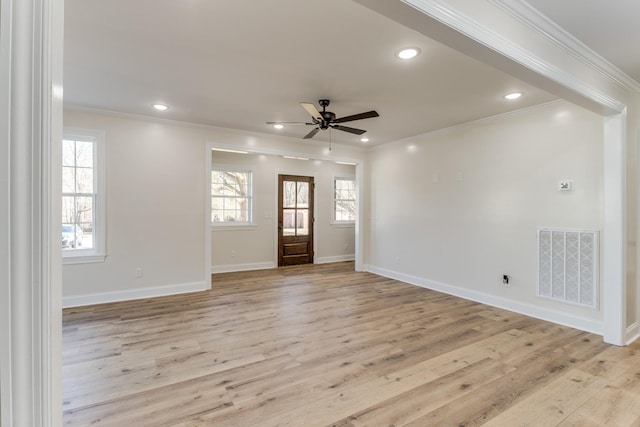 entrance foyer with ceiling fan, light hardwood / wood-style floors, and crown molding