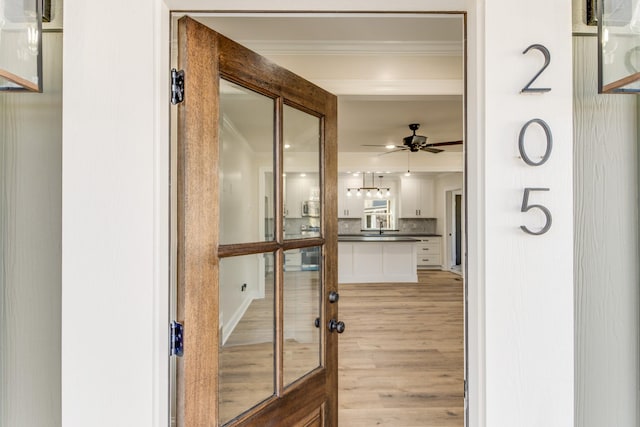 interior space featuring ceiling fan