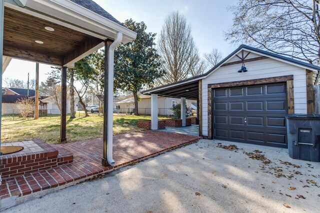 garage with a yard