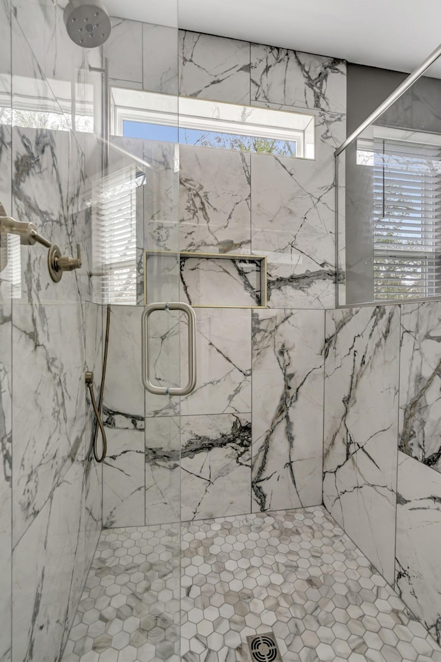 bathroom featuring an enclosed shower