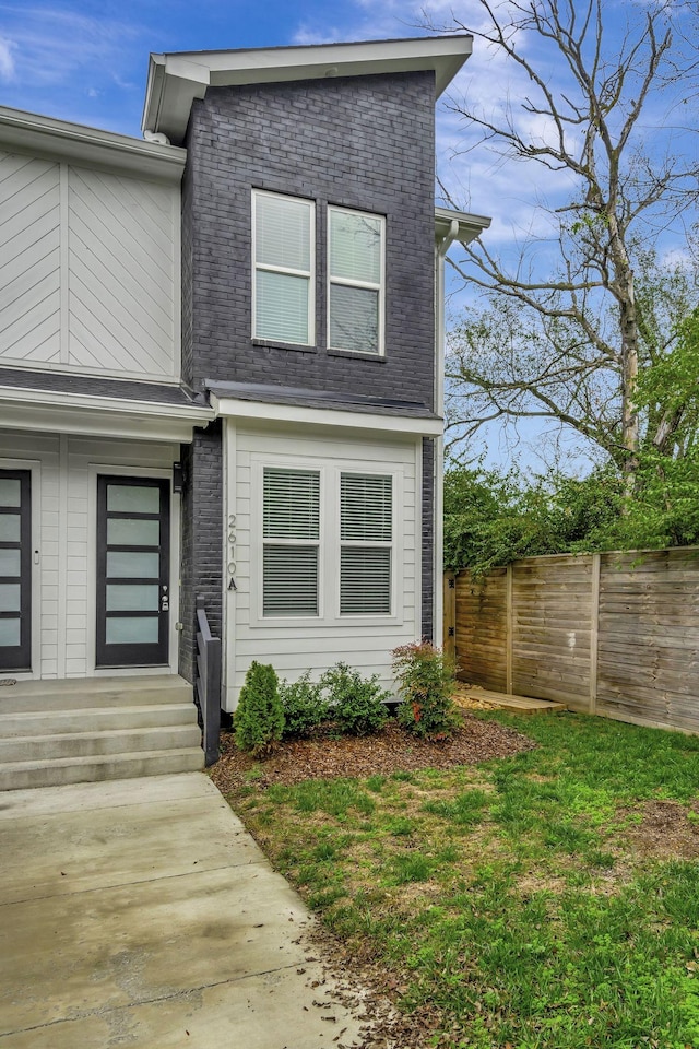 view of front of home with a front yard