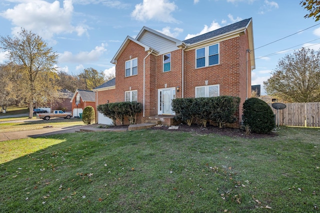 view of front of home featuring a front yard