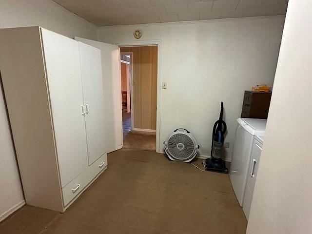 clothes washing area with washer and dryer