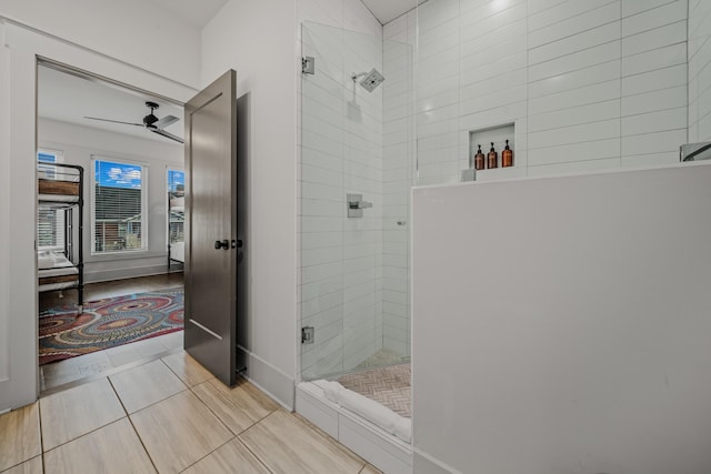 bathroom featuring walk in shower, tile patterned flooring, and ceiling fan