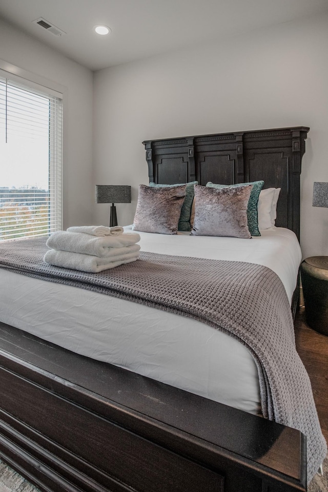 bedroom featuring wood-type flooring