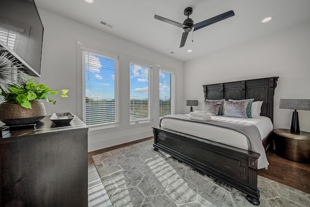 bedroom featuring ceiling fan and light hardwood / wood-style floors